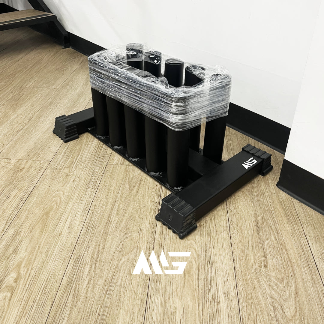 Imagen 1: Soporte vertical de barras olímpicas MIG – vista frontal
